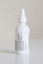 Load image into Gallery viewer, Dresden Holden Acupuncturist in Santa Barbara Ca made Silk water a hydrating toner with organic hydrosols, niacinamide, glycerin, silk amino acids, and is pH balanced to hydrate and heal the skin barrier, in a 2 ounce white glass bottle with a label written in blue font
