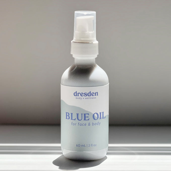 Dresden Body + Wellness santa barbara based acupuncturist Blue Oil organic facial oil in a while glass 2 ounce bottle with a serum pump