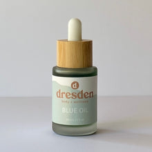 Load image into Gallery viewer, Dresden Body + Wellness Blue Tansy blue oil, lightweight facial oil, gua sha oil, organic skincare, santa barbara, green tea oil, argan oil for sensitive skin in a glass bottle with a bamboo dropper
