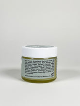 Load image into Gallery viewer, Glass jar of Yin Balm and ingredients, a botanical balm formulated for vulvar comfort and moisture support. Made with herb-infused oils, cocoa butter, mango butter, evening primrose oil, and beeswax for dry, sensitive intimate skin.
