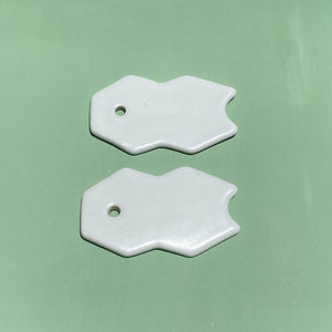 Dresden Holden Body + Wellness ceramic gua sha tool, white porcelain, flat tool, handmade in california