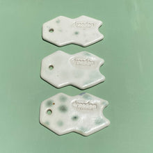 Load image into Gallery viewer, Dresden Holden Body + Wellness ceramic gua sha tool, white porcelain, flat tool, handmade in california white with oxide wash
