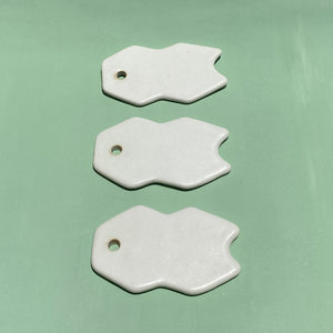 Dresden Holden Body + Wellness ceramic gua sha tool, white porcelain, flat tool, handmade in california